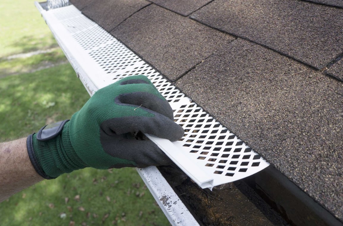 clean and check gutters in Houston
